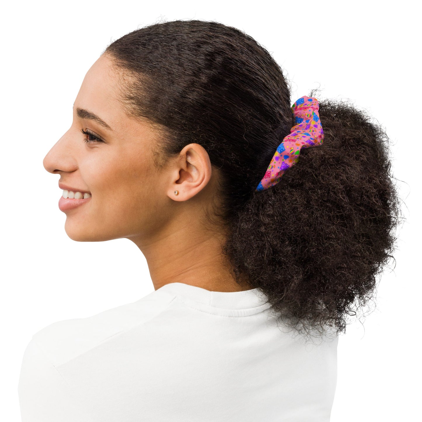 Candy Shop recycled scrunchie worn in hair featuring colorful hand-drawn gummy bear and rainbow candy design by Brittyliz Art