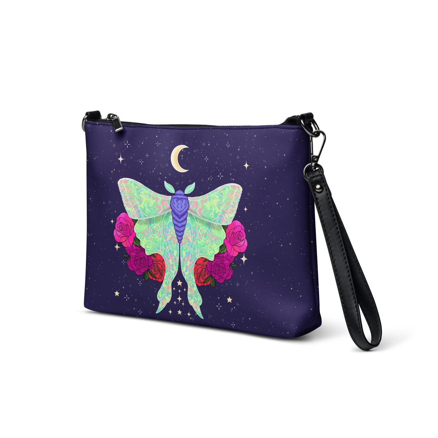 A dark purple wristlet clutch bag with a black wrist strap, decorated with a colorful illustration of a green and purple moth, pink and red roses, and a crescent moon on a starry night sky background.