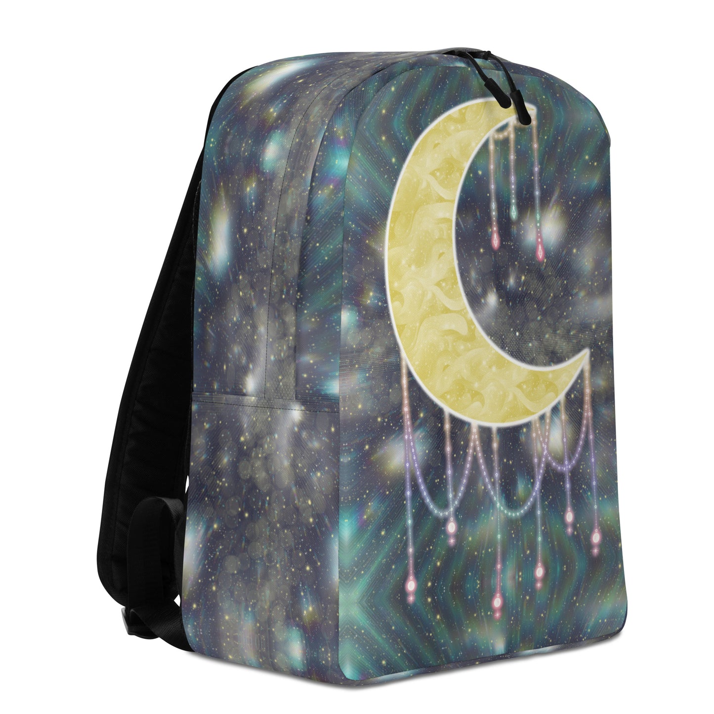 A backpack featuring a celestial print with a large yellow crescent moon, hanging pearl-like beads, and a starry galaxy background in shades of blue, teal, and purple. The backpack has black shoulder straps and a black top zipper pull, shown on a plain white background.